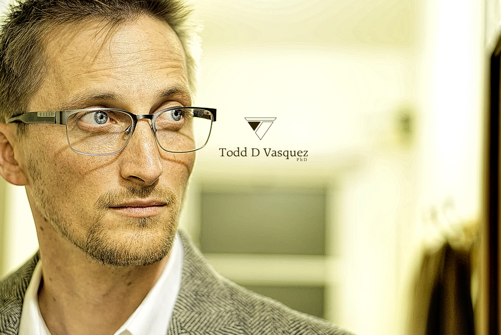 Todd_Looking_Right_at_TDV_PhD_Logo Todd_Looking_Right_at_TDV_PhD_Logo